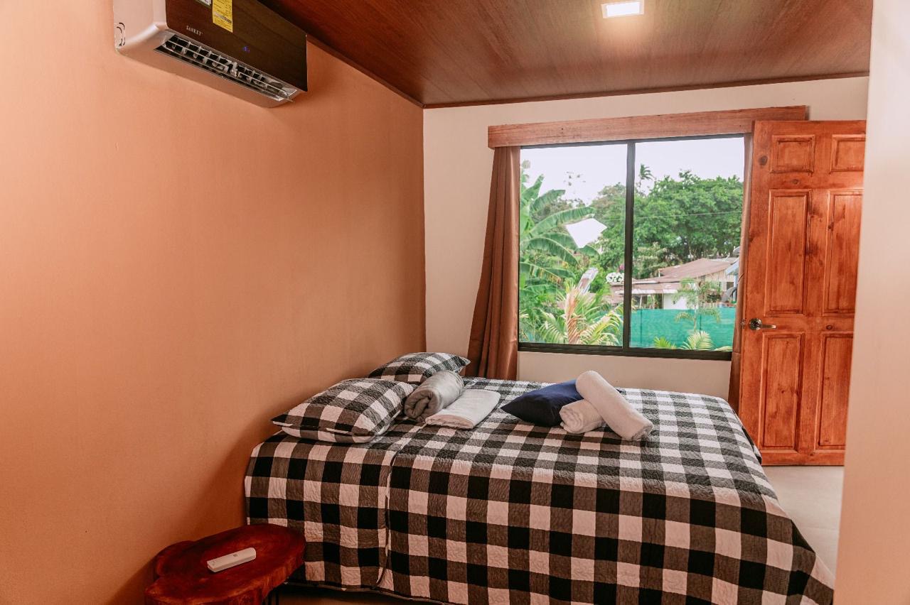 Bedroom with air conditioning and garden view in Chachagua, Costa Rica