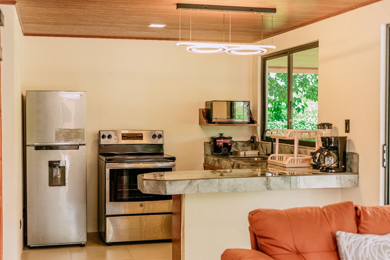 Fully equipped kitchen with modern appliances in Chachagua, Costa Rica home
