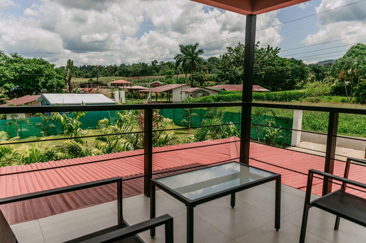 Upper terrace with seating area overlooking the countryside in Chachagua, Costa Rica