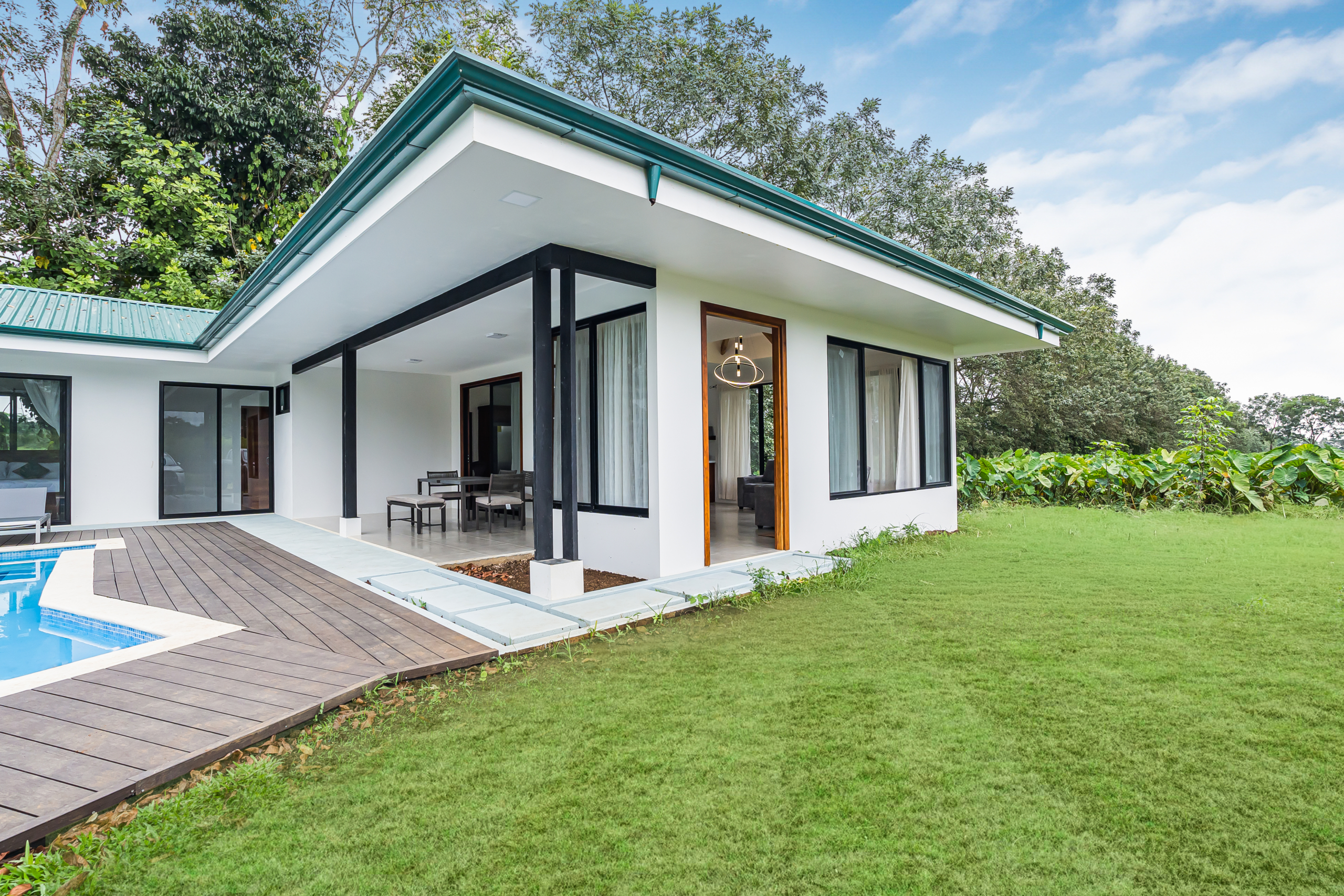 Outdoor dining table with pool view at home 5 minutes from downtown La Fortuna, Costa Rica