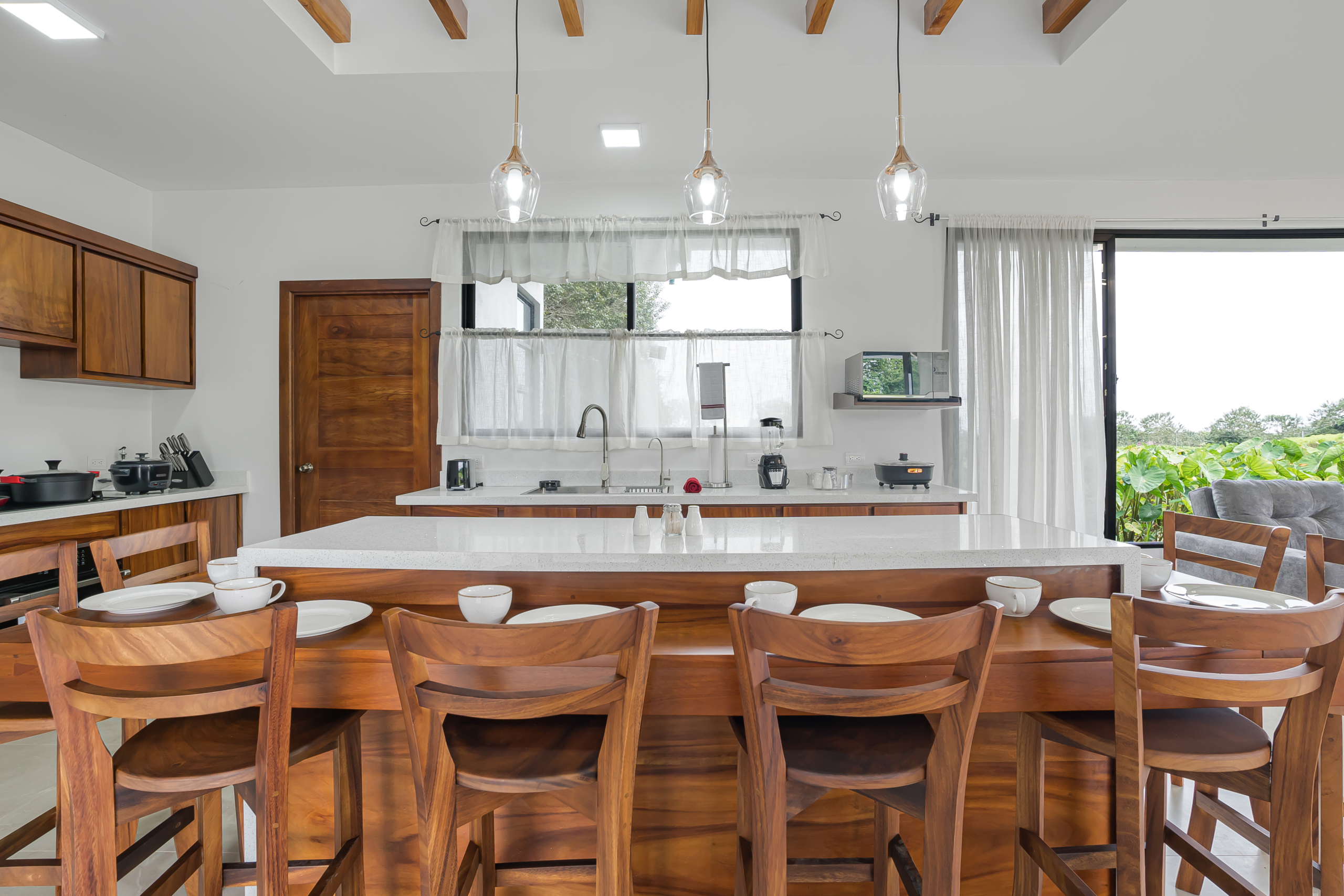 Kitchen island with dining seating at home in La Fortuna, Costa Rica